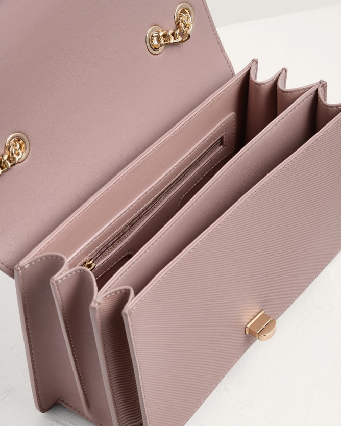 turn lock shoulder bag
