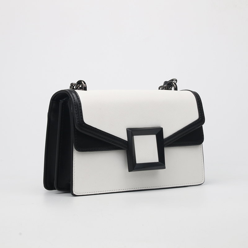 brown and white pocket shoulder bag 