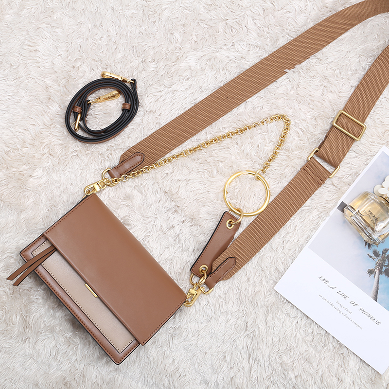 brown leather bag with two straps