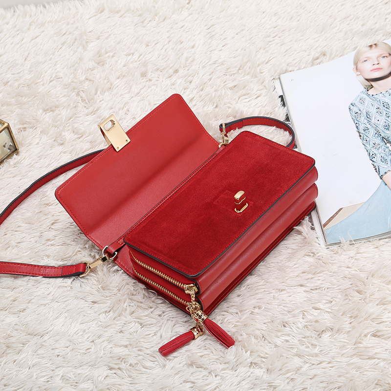 zip crossbody bag with tassels