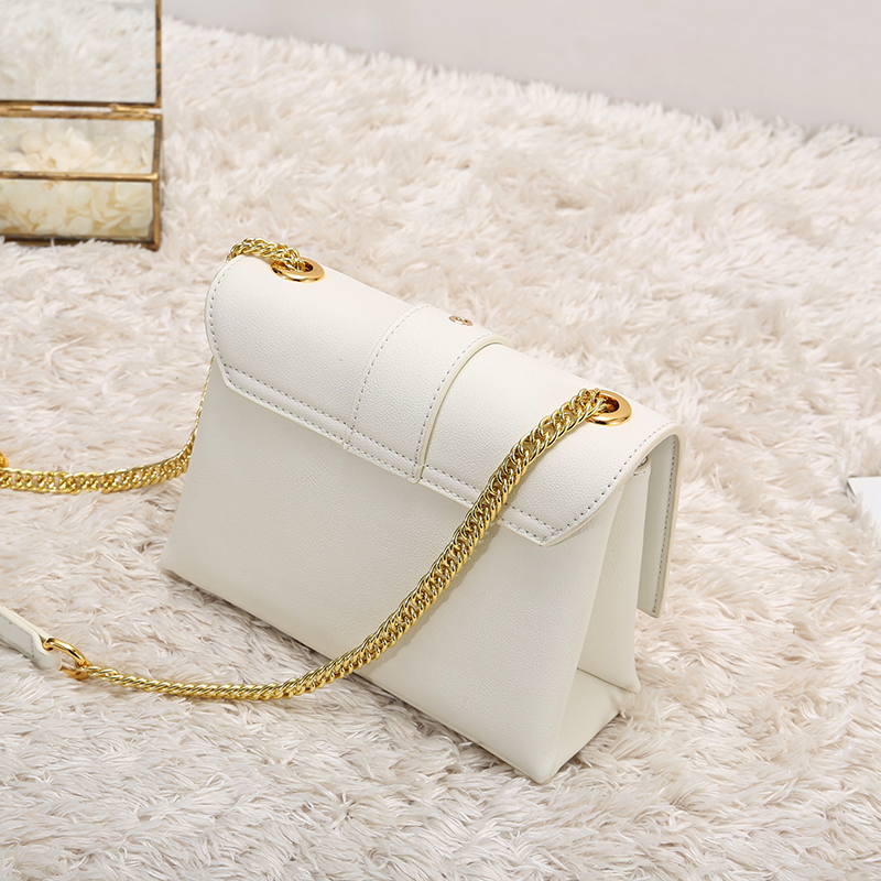 white cowhide crossbody purse