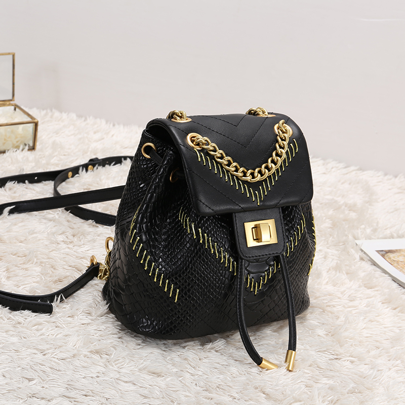 leather backpack with chain handle
