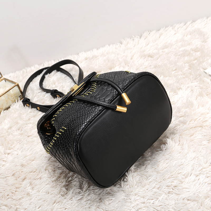 snake embossed leather quilted backpack