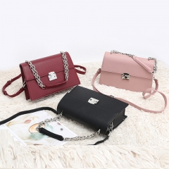 Whipstitched chain satchel bag
